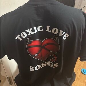 Black T-Shirt with Red Heart Graphic